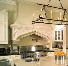 kitchen hood. love the gothic arch Range Hood Ideas, Stone Range Hood, French Inspired Kitchen, Tudor Kitchen, Chimney Range Hood, Hood Ideas, Kitchen Hood, Kitchen Range Hood, Stone Kitchen