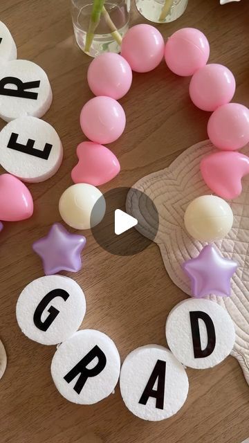 Deborah Trette on Instagram: "friendship bracelet leis for graduation! 🎓 these are SO CUTE! I’ve loved the Taylor Swift garland diys, seriously so clever! 

These were very easy to make and perfect for your littles! I simply thread ball pit shapes and 3in foam discs using an upholstery needle and fishing line! 

save and share! all links under bio!

#diy #diylei #friendshipbraceletdiy #friendshipbracelets #taylorswift #graduation #momlife #momsofinstagram #easycraft #craftidea #diymom #taylorswift" Friendship Bracelet Graduation Lei, Friendship Bracelet Lei, Garland For Graduation, Leis For Graduation, Candy Leis, Candy Lei, 7th Birthday Cakes, Ball Pit Balls, Diy Friendship Bracelet