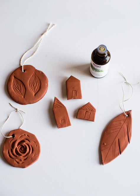 Summer is in the air! Are you looking to freshen up your home with some DIY crafts and decor? These DIY Terra Cotta Air Fresheners will be the perfect aromatherapy your home needs! Simple and easy to make, you can create a natural air freshener to freshen up any room. This DIY summer project is a great way to bring in the summer air with a personal touch. Using lavender, peppermint, or lemon, these oven-bake clay pieces will be the perfect magnet or hanging air freshener. Helping you create a pe Diy Air Freshener, Fimo Polymer Clay, Home Air Fresheners, Natural Air Freshener, Diy And Crafts Sewing, Dry Clay, Crafts For Teens, Summer Crafts, Valentine Crafts