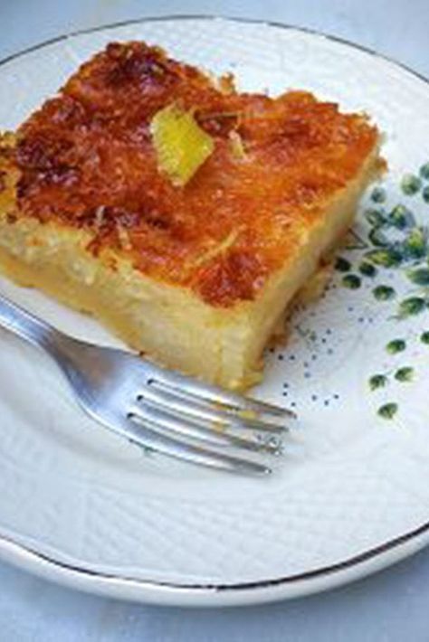 Lemonopita (Greek Lemon Phyllo Cake) | "This Greek dessert is made with Greek yogurt, lemon juice and zest, and lots of shredded phyllo pastry. The texture is unique, and you won't believe how easy it is to make." #worldcuisine #internationalrecipes #globalrecipes #regionalrecipes Lemonopita Cake, Portokalopita Recipe, Phyllo Cake, Greek Dessert, Greek Baklava, Greek Menu, Greek Recipes Dessert, Phyllo Pastry, Birthday 2023