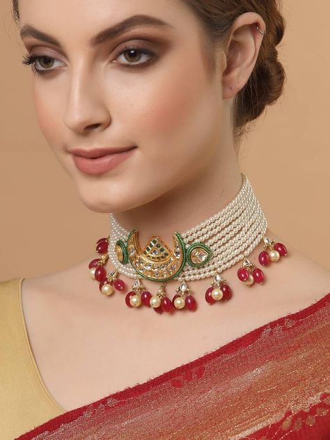 WHITE CHOKER NECKLACE WITH RED BEADS AND GREEN MOON DECORATED PENDANT Sabyasachi Jewellery Choker, Jewellery Choker, Celebrity Necklace, Choker Sets, Multi Layered Necklace, Gold Bracelet Simple, Sterling Silver Choker Necklace, Choker Necklace Designs, Sabyasachi Jewellery