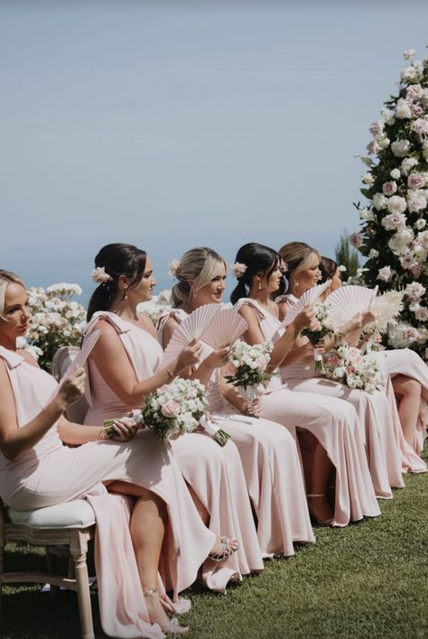 Bridesmaids wearing pale pink one shoulder dresses with bow at shoulder for an Italian outdoor wedding Pink One Shoulder Bridesmaid Dresses, Peony Bridesmaid Dresses, Pearl Pink Bridesmaid Dresses, One Shoulder Gowns, Wedding Guest Outfit Women, Ella Ravenscroft, Pastel Pink Bridesmaid Dresses, Pale Pink Bridesmaids, Bridesmaid Dresses Pink