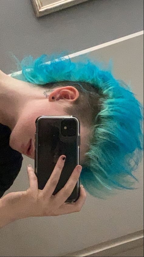 Light blue Mohawk with brown shaved sides Mowhak Hairstyle Pixie, Blue Mullet Aesthetic, Blue Hair Mohawk, Wolfcut Mohawk, Liberty Spike Mohawk, Mullet Blue Hair, Punk Blue Hair, Punk Mohawk Mullet, Fluffy Mohawk Punk