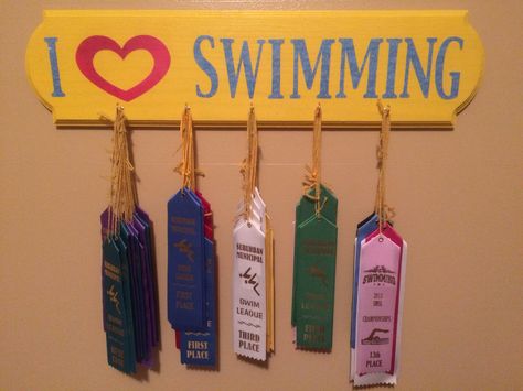 Finally got the swimming ribbons displayed! Swim Ribbons, Swimming Medals, Ribbon Display, Trophy Display, Ribbon Holders, I Love Swimming, Swimmers Life, Medal Ribbon, Award Display