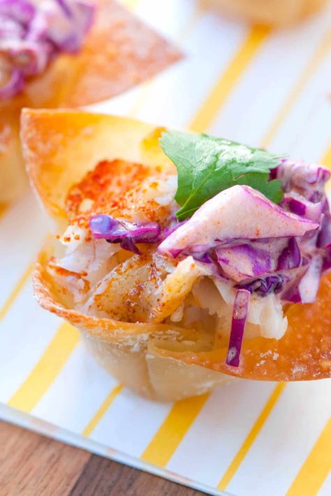 Mini Fish Tacos in Wonton Cups Mexican Fish Tacos, Chipotle Slaw, Taco Appetizers, Wonton Wrapper Recipes, Wonton Tacos, Pollock Fish Recipes, Snapper Fish Recipes, Asian Fish Recipes, Mediterranean Fish Recipe