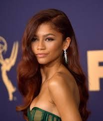 Zendaya Dyed Her Hair Red for the 2019 Emmy Awards | InStyle Coper Hair Color, Dark Copper Brown Hair, Red Hair On Brown Skin, Cinnamon Hair Colors, Burgundy Shades, Copper Brown Hair, Curly Cut, Cinnamon Hair, Dyed Curly Hair