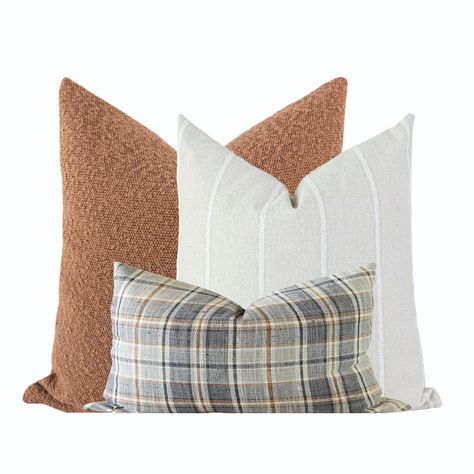 Pillow Combo 192 features (3) of our luxury pillow covers including: ✾ The Harvey Pillow Cover, a rusty orange boucle pillow cover. ✾ The Rylie Stripe Pillow Cover, a white pillow cover with raised white stripes. ✾ The Merritt Pillow Cover, a caramel, grey, and orange plaid pillow. These pillows are perfect for a subtle pop of color in your living room, office, kids' room, or bedroom! Ideal to add to your fall decor for your modern farmhouse or boho style. Handmade in the USA. FEATURES (1) 20x20 Boucle Couch, Boucle Pillow, Pillow Combo, Kids Couch, Pillow Combos, White Pillow Covers, Plaid Pillow, Luxury Pillows, Brown Pillows