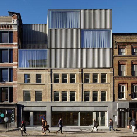 Duggan Morris contrasts mesh with brickwork at Shoreditch office block Duggan Morris, Renovation Facade, Metal Facade, Roof Extension, Office Renovation, London Architecture, Renzo Piano, Brick Facade, Brick Building