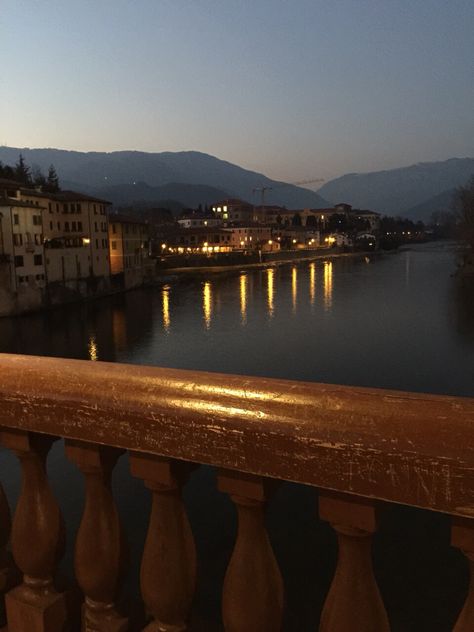 Bassano del Grappa at dusk from the Ponte Vecchio...origins  1200's with additional work by Palladio in the 1500's.... Another hidden secret! Old Town Italy, Bassano Del Grappa, Marina Bay Sands, Old Town, Venice, Vision Board, Old Things, Italy, The Originals