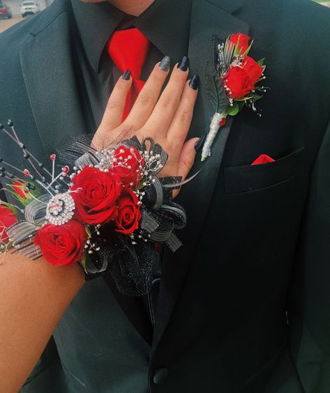 Red Black And White Corsage Prom, Prom Wrist Corsage Ideas For Red Dress, Red Flower Corsage Prom, Corsages For Red Dress, Red Boutonniere Prom, Corsage Prom Red Dress, Prom Corsage Red Dress, Prom Corsages 2022, Flowers For Prom Wrist Corsage