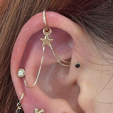 Cassi Lopez on Instagram: "Upper ear upgrades for the sweetest Olivia ✨ #piercer #piercings #sogoldbk #allgoldeverything #safepiercing" Ear Piercing Chain, Top Ear Piercing, Piercing Chain, Upper Ear Piercing, Ear Stack, Funky Jewelry, Ear Piercing, November 17, Over The Top