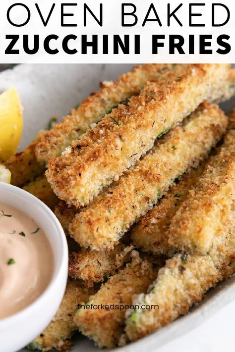 Baked Zucchini Fries are a fun, delicious, and much healthier alternative to fried potatoes. Super easy to make, thinly sliced zucchini is coated in flour, dipped in egg, and covered in a crunchy panko breadcrumb and parmesan mixture before being baked in the oven until tender on the inside and crunchy on the outside. Oven Baked Zucchini Fries, Crispy Zucchini Fries, Oven Baked Zucchini, Baked Zucchini Fries, Parmesan Zucchini Fries, Sliced Zucchini, Crispy Zucchini, Zucchini Recipes Baked, Zucchini Sticks