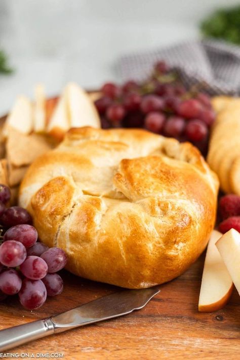 Crescent Baked Brie, Crescent Roll Baked Brie, Brie In Crescent Roll Baked, Brie Cheese Crescent Rolls, Brie Crescent Roll Baked, Baked Brie In Crescent Dough, Cranberry Brie Crescent Rolls, Baked Brie Pillsbury Crescent Rolls, Brie In Crescent Roll