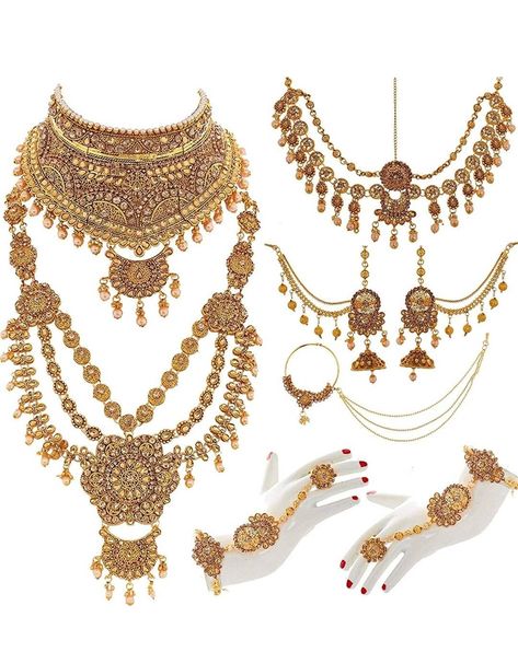 DESIGNER HIGH QUALITY FULL ROYAL RAJWADA BRIDAL JEWELLERY SET FOR WEDDING Full Bridal Gorgeous Statement Indian Bollywood Antique Gold Ivory Faux Pearl Kundan Stone Necklace Jewellery Set/Dulhan Jewelry Set. Perfect For Wedding, best quality and durable! Includes: 2 Necklace Pair Of Earrings Maangtikka/Maathapatti Hathphool Pair Nose Ring/Nath Beautifully handcrafted set filled with Antique Gold stones, pearls & beads. The back is held together using strong thread to hold the piece together. Royal Jewelry Indian, Jewellery Sets Bridal, Full Bridal Jewellery Set, Jewellery Set For Wedding, Hindu Jewelry, Bridal Jewellery Online, Traditional Bridal Jewelry, Draw Reference, Bridal Jewelry Sets Brides