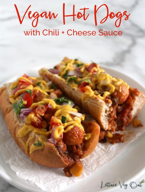 Two fully loaded hot dogs in whole wheat buns and topped with chili, diced tomato, chopped red onion, minced cilantro and a drizzle of orange cheese sauce. Hot dogs sit on crumpled parchment paper on small white plate. Red text centered at top reads "Vegan Hot Dogs with Chili + Cheese Sauce" over two lines. Vegan Chilli Cheese Dogs, Vegan Hot Dog Toppings, Vegan Chili Cheese Dogs, Vegan Hotdogs Recipe, Vegan Chili Dogs, Vegan Hot Dog Chili, Chili Dog Recipe, Chili Cheese Dog Recipe, Chilli Cheese Dogs