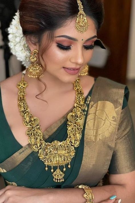 Find the best bridal makeup artists in your budget & desired city with contact information, portfolio & trusted reviews at Weddingbazaar - Trusted Wedding Services for Every Indian Wedding! #southindianwedding #southindianbride #southindianbridemakeup #southindianbridemakeuplook #southindianbridemakeover Eye Makeup For Saree Indian Weddings, Reception Makeup Indian Bride Saree, Tamil Bride Makeup Look, Tamil Hairstyle For Saree, Seemantham Makeup Look, South Indian Bridal Eye Makeup, Muhurtham Makeup Look, South Indian Bride Eye Makeup, Tamil Engagement Look