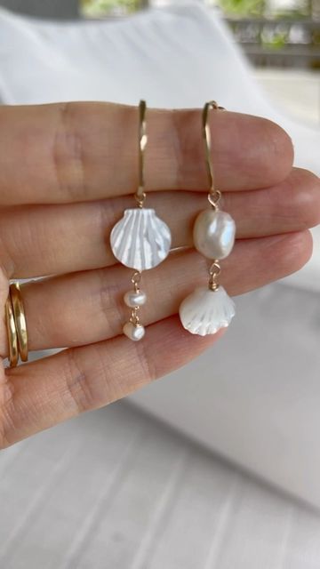 JAMES MICHELLE JEWELRY on Instagram: "🐚 NEW 🐚 Limited Release: Calypso Earrings✨ These handmade beachy earrings feature freshwater pearls and our pearlescent clamshell beads. They are the perfect way to add a little touch of the sea to any day. 🌊 Just like our NEW Calypso Necklace, these earrings are a limited run, so don't miss out!🌴 #jamesmichelle #jewelrydesign #jewelryaddict #jackjohnson #jewelry #jewelrydesigner #handmadejewelry #customjewelry #beachjewelry #ocean #sand #surf #starfish Shell And Pearl Jewelry, Beachy Pearl Jewelry, Beachy Boho Earrings, Shell Pearl Earrings, Pearl Shell Jewelry, Diy Seashell Earrings, Handmade Beach Jewelry, Homemade Shell Jewelry, She’ll Earrings