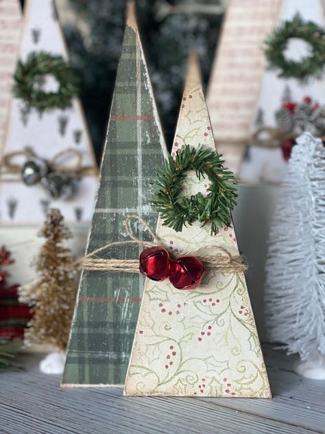 Add these beautiful trees to your decor for the wow factor! Each set is a pair of two and you choose your favorite pattern. The tall tree measures approximately 6" and the shorter tree measures approximately 5" tall. Easily displayed on a tiered tray, dress up a bathroom or kitchen or display on a mantel. They are very versatile! Three patterns to choose from: Green plaid Red/white stripe Music Notes Simple Wood Christmas Tree, Wood Block Christmas Tree, Wood Christmas Tree Crafts, Triangle Gnomes, Wood Triangle Christmas Tree, Wooden Tree Decor, Wooden Christmas Trees Rustic, Christmas Tree Wood Crafts, 2x4 Christmas Crafts