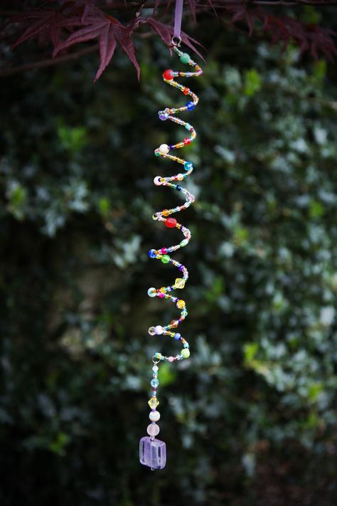 Beaded Lilac Pale Purple Spiral Sun Catcher Suncatcher - Etsy UK Seed Bead Suncatchers, Memory Wire Suncatcher, Beaded Sun Catchers Diy, Spiral Suncatcher, Hobbies To Pick Up, Spiral Sun, Crystal Suncatchers Diy, Fairy Garden Designs, Beaded Memory Wire