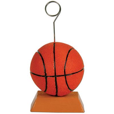 Decorate your sports themed party with this Basketball Photo Holder Picture Frame. | The Party Aisle™ Basketball Photo Holder Picture Frame Ceramic in Brown/Orange, Size 5.0 H x 2.5 W x 2.5 D in | Wayfair Basketball Banquet, Hanging Balloons, Basketball Theme Party, Basketball Decorations, Balloon Holders, Basketball Birthday Parties, Basketball Backboard, Banquet Ideas, Ball Birthday Parties