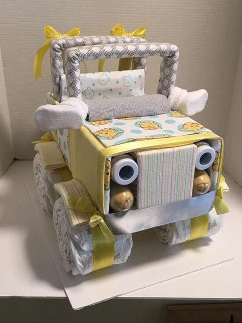 Crafty Fun Group | A Jeep diaper cake I made for a baby shower gift | Facebook Diaper Jeep, Jeep Diaper Cake, Unique Diaper Cakes, Diy Diaper Cake, Diy Baby Shower Gifts, Christmas Tree Bows, Fun Group, Diaper Cakes, Baby Shower Diy