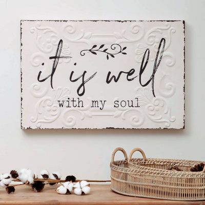 Hang our it is well with my soul ornate wall decor to express your faith and peace with rustic chic style. This wall sign features a large rectangular shape with a distressed finish, text design, and embossed floral details. Can be used in your entryway, living room, bedroom, or as a special gift for your family or friend to start a new life. | Gracie Oaks It Is Well w / My Soul Ornate Metal Wall Decor Metal in Black / Brown / Gray | 15.94 H x 24.02 W x 1.77 D in | Wayfair | Home Decor Tuscan Wall Decor, Start A New Life, Entryway Wall Decor, Handmade Wall Decor, It Is Well With My Soul, Accent Wall Decor, Floral Wall Decor, Church Decor, Dining Room Walls