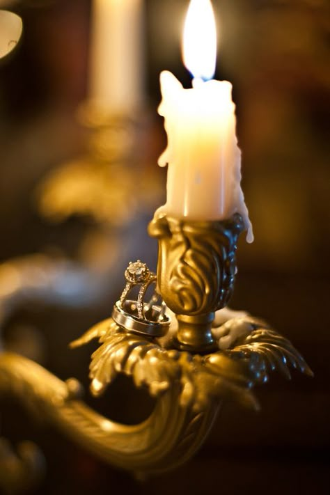 Candelabra with wedding rings. Great photo. Josephine Montilyet, Beauty And The Beast Aesthetic, The Beast Aesthetic, Beast Aesthetic, Belle Aesthetic, Aesthetic Disney, Bring Back Lost Lover, Black Magic Spells, A Night At The Opera