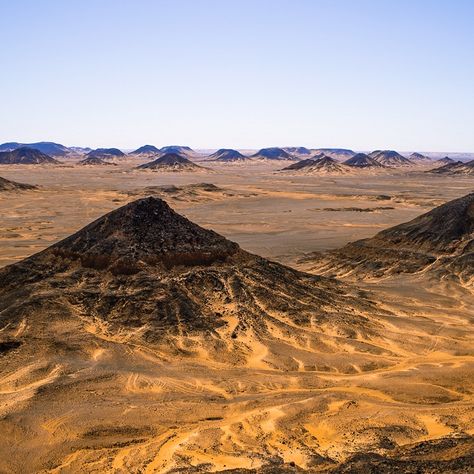 The Desert is calling and we HAVE to go! 🥳 An ideal blend of discovering the enchanting landscapes of Egypt on a 3-day journey to the White Desert and Bahariya Oasis. Where we explore ancient wonders in Bahariya, from the nobles tombs dating back to the 26th Dynasty to delving into a bygone era with the Golden Mummies Hall. Then, be mesmerized by the otherworldly beauty of the Black Desert and the White Desert's unique rock formations and enjoy a one-of-a-kind night camping under the starr... Otherworldly Beauty, Night Camping, Black Rock Desert, White Desert, Black Desert, Bygone Era, Rock Formations, The Desert, The Golden