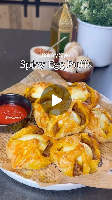 Fathima Yusuf (Shadiya) on Instagram: "Save this !! Ramadan series Episode:12  Spicy Bakery Style Egg Puffs !!  A savory delight for any time of the day & a nostalgic recipe which is has so many good memories having it fresh from the bakery every morning before leaving for school. It’s spicy slightly sweet and has everything you need in a flaky puff..   LIKE, SAVE, SHARE the reel & FOLLOW @shadi_faleel for more easy recipes.  You’ll need 5 eggs hard boiled and cut into halves  1/3 cup Oil 4 Sliced red onions  4 cloves of Chopped Garlic  1 tsp Salt or slightly more according to your taste  1 tsp Turmeric powder  1 tsp Cumin powder  1 tsp Red chilli powder  2 tsp Chilli flakes 1 tsp Kashmiri chilli powder (optional) 1 & 1/2 tbsp Sugar Juice of half a Lime Few Curry leaves (optional )  One eg Egg Puffs Recipe, Egg Puff Recipe Indian, Egg Puff Recipe, Egg Recipes Indian, Ramadan Series, Kashmiri Chilli, Egg Puff, Spicy Eggs, How To Make Eggs