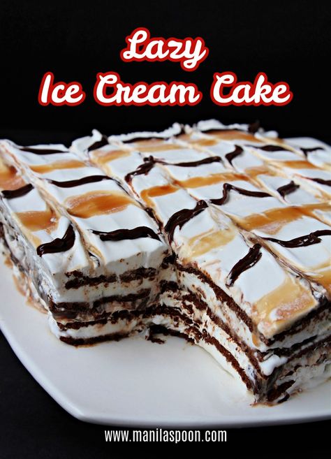 Layers of your favorite ice cream sandwich, whipped cream, chocolate fudge and caramel sauces and sprinkled with nuts (and some more sauce on top!) - this Lazy Ice Cream Sandwich Cake is summer's yummiest treat! Did I mention it is crazy EASY to make? Diy Ice Cream Sandwich Cake, Ice Cream Sandwich Cake With Oreos, Easy Ice Cream Sandwich Dessert, Layered Ice Cream Desserts, Ice Cream Sandwiches Cake, Ice Cream Sandwich Cakes, Ice Cream Cake With Ice Cream Sandwiches, Ice Cream Sandwich Dessert Recipe, Caramel Sauces