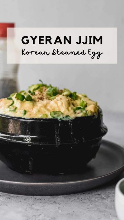 Soft and fluffy Korean Steamed Eggs, also known as Gyeran Jjim. Make this classic and popular Korean side dish in only 15 minutes! Enjoy the fluffy texture and savory, addictive flavor. A universally adored Korean recipe that's extremely versatile. And easy to make! Korean Fluffy Egg, Korean Steamed Eggs Recipe, Korean Steamed Egg Recipes, Korean Eggs Marinated, Korean Steamed Egg Microwave, Korean Steamed Egg, Steamed Eggs, Korean Side Dishes, Korean Food