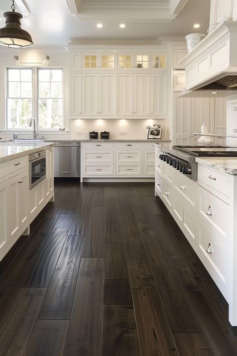 19 Flooring Ideas That Perfectly Match White Kitchen Cabinets Dark Wood Floor Kitchen Modern, White Kitchen With Dark Brown Floors, Kitchens With Dark Hardwood Floors, Dark Floors With White Cabinets, Kitchen Dark Floors Light Cabinets, Dark Wood Floors Kitchen Cabinets, Farmhouse Kitchen With Dark Floors, Dark Floors Light Cabinets Kitchen, Farmhouse Kitchen Flooring Ideas Wood