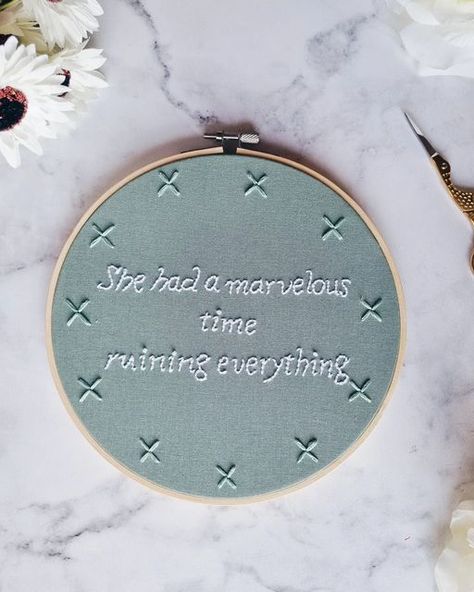 Taylor Swift inspired embroidery hoop. Aqua fabric with text saying She had a marvelous time ruining everything in white thread Taylor Swift Lover Embroidery, Hand Embroidery Taylor Swift, She Had A Marvelous Time Ruining Everything, Taylor Swift Lyric Embroidery, Taylor Swift Lyrics Embroidery, Taylor Swift Inspired Embroidery, I Had A Marvelous Time Ruining Everything Taylor Swift, Taylor Swift Needlepoint, Taylor Swift Embroidery Pattern