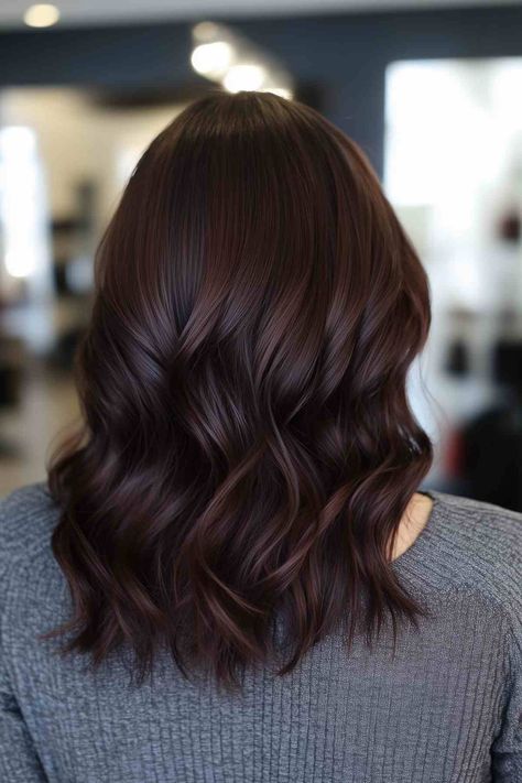 25 Fall Hair Colors Every Brunette Will Want to Try This Season Dark Fall Hair Colors For Brunettes, Violet Brown Hair With Highlights, Light To Dark Brown Hair, Dark Brown Dimensional Hair Color, Dark Brown Hair With Lowlights Caramel, Lived In Brunette Balayage Dark Roots, Dark Toner For Brown Hair, Fall Haircut 2024, Dark Brown Warm Hair