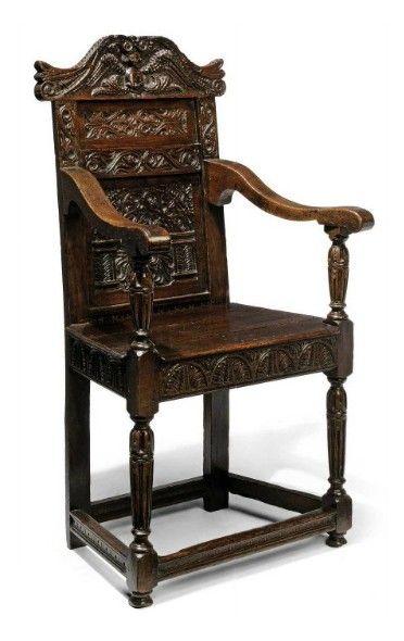 AN ELIZABETHAN OAK ARMCHAIR LATE 16TH CENTURY  - carved back with centred with a cherub and an arcaded panel, the arms with fluted supports and the carved seat-rails above fluted, turned legs joined by channelled stretchers. English Antique Furniture, Interior Design History, Medieval Furniture, Upscale Furniture, Antique Cupboard, Oak Armchair, English Furniture, Antique Chairs, Armchair Furniture