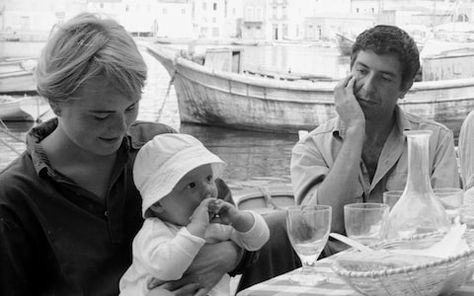 Marianne Ihlen with her son Axel, sat beside Leonard Cohen in Hydra, Greece, October 1960 Marianne Ihlen, Leonard Cohen Lyrics, Biological Father, Wall Of Fame, Leonard Cohen, September 21, Life Pictures, Interesting People, Picture Collection