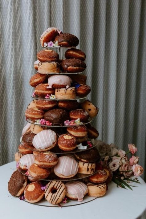 Wedding Donut Tower on Acrylic Cupcake Stand | The Pretty Prop Shop Wedding & Event Hire, Auckland, New Zealand Unique Donut Display, Donut Towers, Doughnut Tower, Doughnut Wedding Cake, Donut Wedding Cake, Rustic Wedding Groom, Acrylic Cupcake Stand, Donut Tower, Donut Display