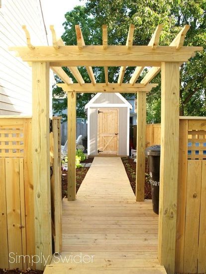 We recently had a pool installed in our backyard, but the construction left us with no fence and a torn up side yard. We decided to build a new gate with custom inset lattice panels and a built in arbor. We also built a boardwalk to connect the front yard to the back surround by a shade garden. Once the wood acclimates we plan to stain the fence and boardwalk.  This project isn't for the faint of heart. After spending an entire Saturday nailing up fence boards I have a new respect for… Pergola Arbor, Nautical House, Fence Building, Trellis Gate, Gates Ideas, Fence And Gate, Backyard Gates, Small Pergola, Pool Installation