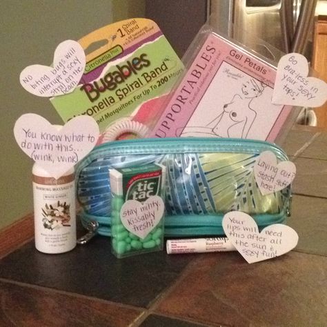 Creative bachelorette gift...  Find out where the couple is going on their honeymoon and put together some fun "essentials" specific to the trip.  Then, write fun/sexy directions and put them on each item.  This gift is for a tropical honeymoon such as the beach or a cruise.  There's a small bag for the beach, massage oil, chap stick, tic tacs, bug repellant, and gel petals. Spa Things, Beach Massage, Bug Repellant, Bag For The Beach, Wedding Goodies, Tropical Honeymoon, Bachelorette Cruise, Bridal Events, Bachelorette Gift