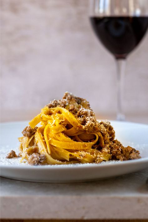 Fresh pasta tossed with iconic Ragu alla Bolognese and Parmigiano Reggiano cheese. Upgrade spaghetti night with Tagliatelle alla Bolognese and discover why it’s loved by so many. Pasta Bolognese Photography, Traditional Ragu Bolognese Sauce, Anne Burrell Pasta Bolognese, Tagliatelle Bolognese, Pasta Puttanesca Food Network, Ribbon Pasta, Pasta Fork, Smitten Kitchen Lasagna Bolognese, Tagliatelle Pasta