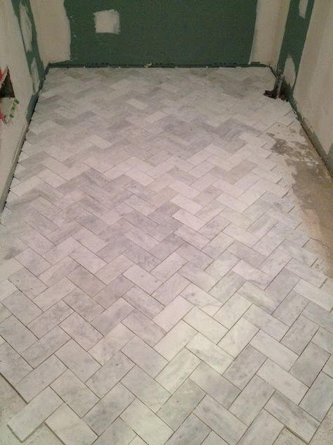 So I talked a little bit about our guest bathroom reno here , here , and here (and yes, that first link really was over a year ago - that's... White Herringbone Tile Floor, Tile Herringbone Pattern, Herringbone Bathroom Floor, Herringbone Bathroom, Backsplash Herringbone, Herringbone Subway Tile, White Herringbone Tile, Entry Floor, Herringbone Tile Floors