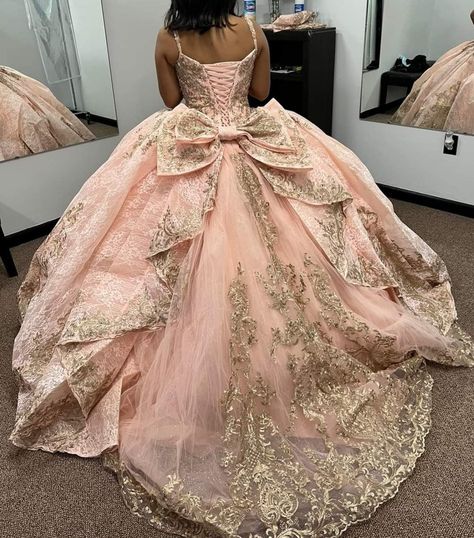 Big Bow Quince Dress, Quince Dress With Bow In The Back, Blush Pink And Gold Quinceanera Dress, Sleeping Beauty Quinceanera Theme Dress, Quinceanera After Party Outfit, Quince Dresses With Bow On Back, Pink Quince Dress With Bow, Pink Quinceanera Dresses With Bow, Quince After Party Dress