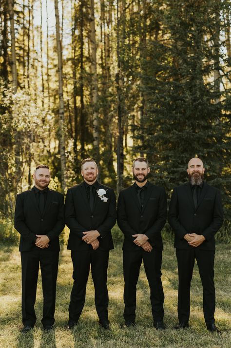 Traditional and Minimalist Alberta Wedding | IG: Hair - @theothersidehairstudio Bridesmaids Dresses - Baltic Born Groomsmen Attire - @jensenslifestyleclothing Wedding Gown - @delicabridal Wedding Photography - @ej.lifestyle #albertwedding #weddinginspo #minimalwedding #outdoorwedding All Black Mens Wedding Attire, Black On Black Groomsmen, Groomsmen All Black Attire, Groomsmen Vest Only, All Black Groomsmen Attire, All Black Groom Attire, Winter Groomsmen, Fall Wedding Groomsmen Attire, Black Groomsmen Attire