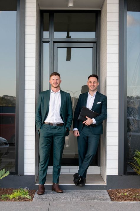 Two Gentlemen in Their Suits Standing Outside A Building Loan Officer Headshots, Male Real Estate Agent Aesthetic, Business Group Photos Outdoor, Real Estate Team Branding, Personal Branding Real Estate Agent, Real Estate Agent Portraits, Real Estate Lifestyle Photos Men, Real Estate Agent Photoshoot Men, Real Estate Agent Lifestyle Photography