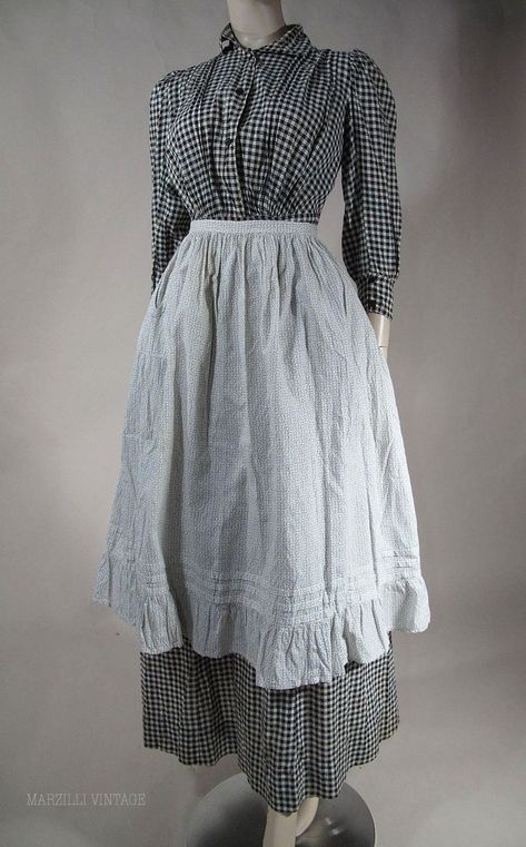 1890 aprons | 1890's Black & White Gingham Day Dress With Calico Apron 1800 Poor Clothing, 1900s American Fashion, 1890s Fashion Women Day Dresses, 1900s Fashion Poor, Victorian Poor Clothes, 1890s Fashion Women Casual, 1840s Fashion Poor, 1890s Dress Poor, 1890s Fashion Poor