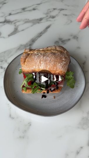 636K views · 54K reactions | Italian sandwich recipe below ✨

I make this sandwich for lunch alllll the time because it’s so easy and tastes AMAZING! I also love the simple ingredients so give it a try this week if you’re in need of a new lunch fixation 🫶🏼

Ingredients:
-Ciabatta 
-Olive oil 
-pesto 
-prosciutto
-arugula 
-tomato 
-burrata 
-salt and pepper 
-balsamic glaze 

Instructions:
-Drizzle olive oil over your ciabatta and toast. Assemble your sandwich with the rest of the ingredients, drizzle over balsamic vinegar and enjoy! 

#healthyrecipes #lunchrecipes #easyrecipes #italiansandwich #ciabatta #healthylifestyle | Audrey Lillian Italian Sandwich Recipe, Italian Sandwich Recipes, Sandwich For Lunch, Italian Sandwich, Sandwiches For Lunch, Good Foods, Balsamic Glaze, Sandwich Recipe, Sandwich Recipes