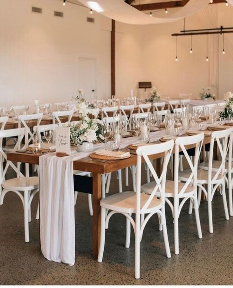 Wooden Table White Chairs, Farmhouse Table Wedding Reception, White Table Runners Wedding, Wooden Table White Runner, Wood Table White Chairs Wedding, Wood Tables With White Chairs Wedding, Wooden Table Runner Wedding, Table Setting Wooden Table, Wood Table White Runner Wedding