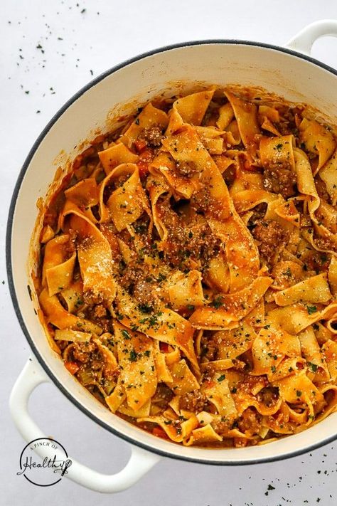 This pappardelle Bolognese recipe makes a classic dish that combines tender pappardelle pasta with a hearty, flavorful sauce. Pappardelle Pasta Dishes, Veal Ragu Pappardelle, Pappardelle Bolognese Recipe, Pasta With Bolognese Sauce, Parpadelle Ragu, Classic Pasta Recipes, Beef Pappardelle Recipes, Paparadelle Recipes Noodles, Papadeli Pasta Recipes