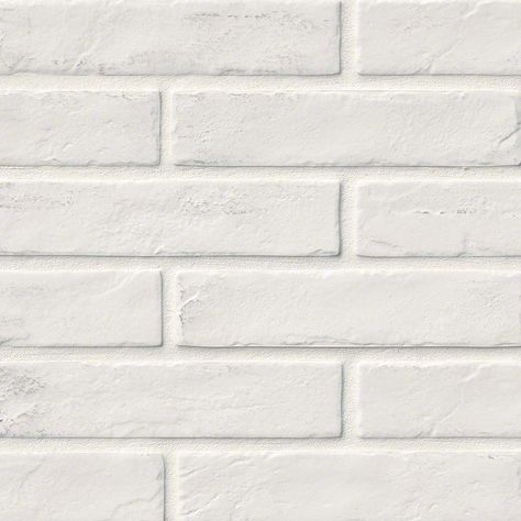 Love the look of an exposed brick wall? Easily recreate the look in your home with porcelain brick tile! Check out brand new Capella White Brick – a stylish painted brick option perfect for interior and exterior tile projects. White Brick Tile, White Brick Tiles, Rustic Brick Wall, Brick Backsplash Kitchen, Creative Beds, White Porcelain Tile, Brick Look Tile, Residential Flooring, Backsplash Panels