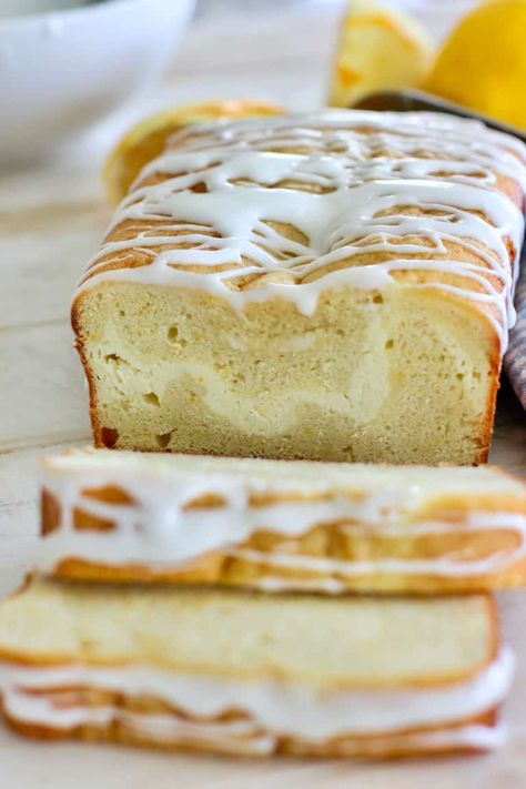 Fresh Lemon Loaf Cake with a ribbon of cream cheese running through it! Fresh and perfect for every occasion! Lemon Blueberry Cream Cheese Loaf, Lemon Cream Cheese Loaf Cake, Lemon Cream Cheese Bread Recipe, Cream Cheese Baked Goods, Lemon Cream Cheese Loaf, Lemon Breads, Lemon Cream Cheese Dessert, Cream Cheese Loaf, Blueberry Pie Bars